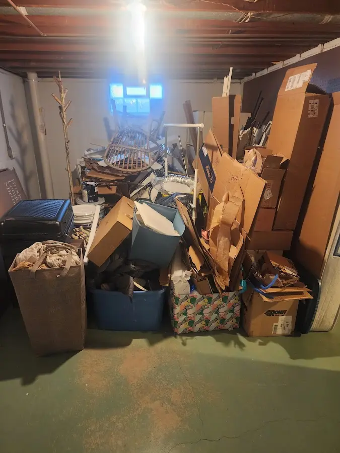 Roll-off dumpster container at job site for 6 Yard Dumpster Rental in Houma